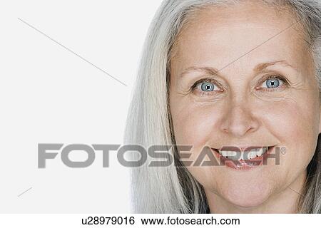 Stock Photograph - Studio portrait of mature woman. Fotosearch