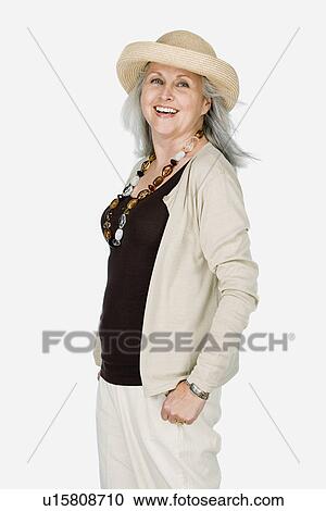 Studio portrait of mature woman wearing hat View Large Photo Image Stock Image - Studio portrait of mature woman wearing hat. Fotosearch
