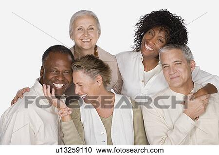 Stock Image - Studio portrait of senior friends. Fotosearch