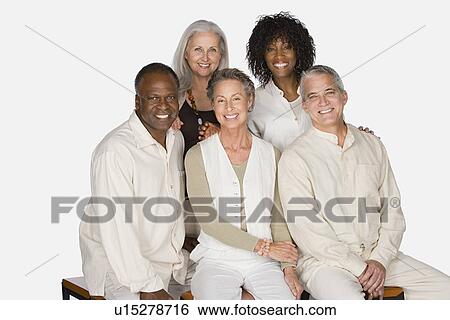 Stock Photograph - Studio portrait of senior friends. Fotosearch