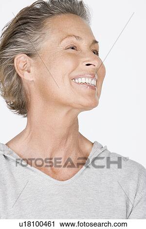 Studio portrait of senior woman View Large Photo Image Stock Image - Studio portrait of senior woman. Fotosearch