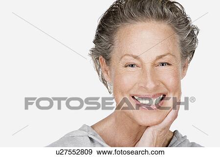 Studio portrait of senior woman View Large Photo Image Stock Photo - Studio portrait of senior woman. Fotosearch