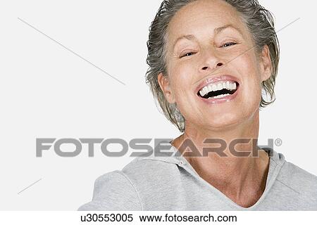 Stock Photography - Studio portrait of senior woman. Fotosearch