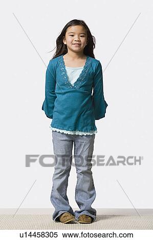 Studio portrait of smiling girl (8-9) View Large Photo Image Stock Photography - Studio portrait of smiling girl (8-9). Fotosearch