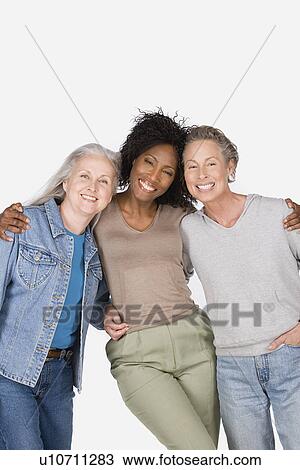Studio portrait of three women View Large Photo Image Stock Image - Studio portrait of three women. Fotosearch