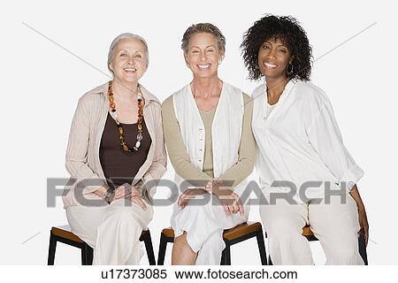 Stock Photography - Studio portrait of three women. Fotosearch