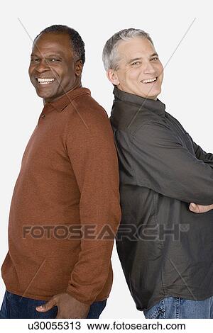 Studio portrait of two mature men View Large Photo Image Stock Image - Studio portrait of two mature men. Fotosearch