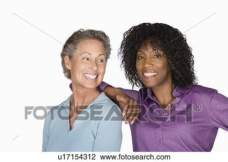 Studio portrait of two mature women View Large Photo Image Stock Image - Studio portrait of two mature women. Fotosearch