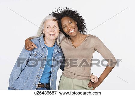 Studio portrait of two mature women View Large Photo Image Stock Photo - Studio portrait of two mature women. Fotosearch