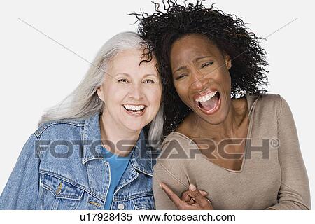 Studio portrait of two mature women View Large Photo Image Stock Photography - Studio portrait of two mature women. Fotosearch