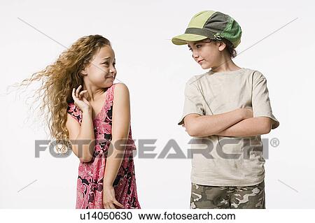 Studio portrait of two smiling girls (8-9) View Large Photo Image Stock Image - Studio portrait of two smiling girls (8-9) . Fotosearch
