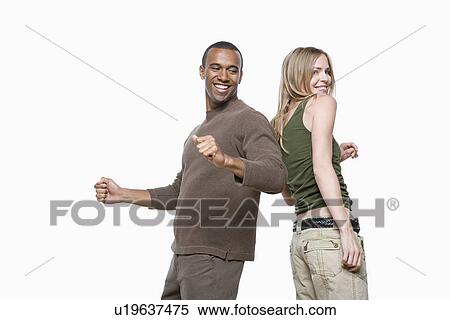 Stock Photography - Studio portrait of two young friends. Fotosearch