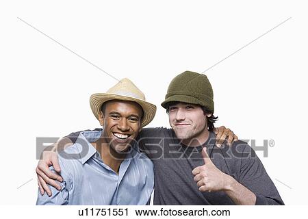 Studio portrait of two young men View Large Photo Image Stock Image - Studio portrait of two young men. Fotosearch