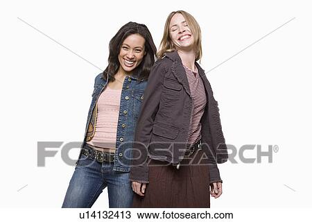Stock Image - Studio portrait of two young women. Fotosearch