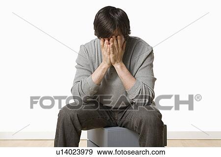 Studio portrait of young man crying View Large Photo Image Stock Photo - Studio portrait of young man crying. Fotosearch