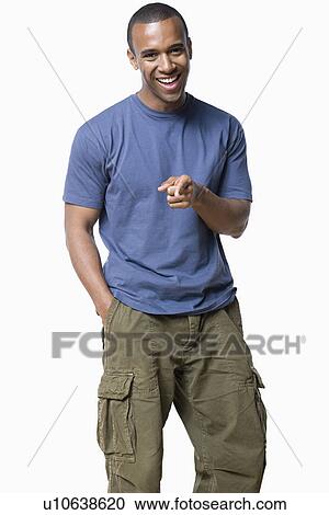 Studio portrait of young man View Large Photo Image Stock Image - Studio portrait of young man. Fotosearch