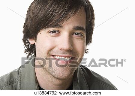 Studio portrait of young man View Large Photo Image Stock Image - Studio portrait of young man. Fotosearch