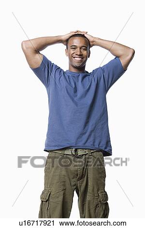 Studio portrait of young man View Large Photo Image Stock Image - Studio portrait of young man. Fotosearch
