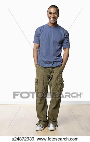 Studio portrait of young man View Large Photo Image Stock Photo - Studio portrait of young man. Fotosearch