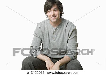 Stock Photograph - Studio portrait of young man. Fotosearch