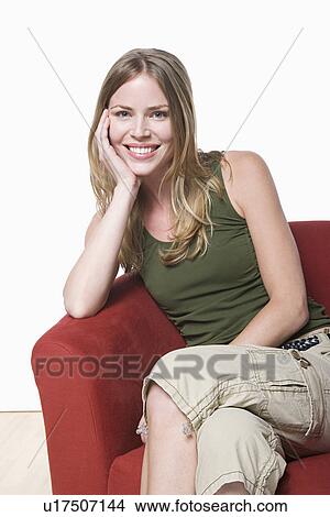 Picture - Studio portrait of young woman. Fotosearch