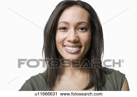 Stock Image - Studio portrait of young woman. Fotosearch