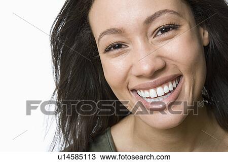 Studio portrait of young woman View Large Photo Image Stock Image - Studio portrait of young woman. Fotosearch