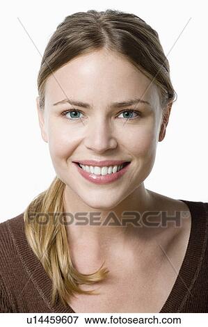 Stock Photo - Studio portrait of young woman. Fotosearch