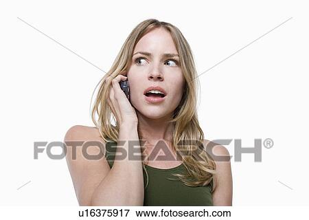 Stock Photo - Studio portrait of young woman. Fotosearch