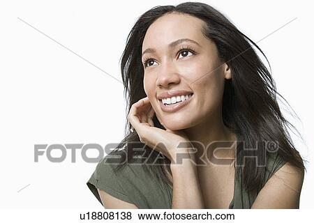Studio portrait of young woman View Large Photo Image Stock Photo - Studio portrait of young woman. Fotosearch