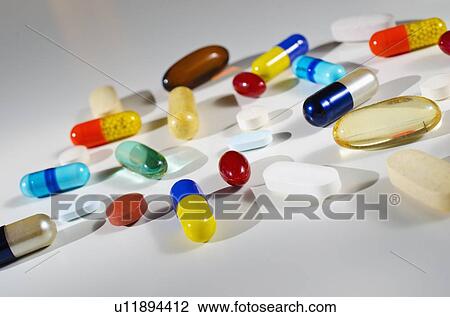 Studio shot of various pills and capsules View Large Photo Image Stock Image - Studio shot of various pills and capsules. Fotosearch