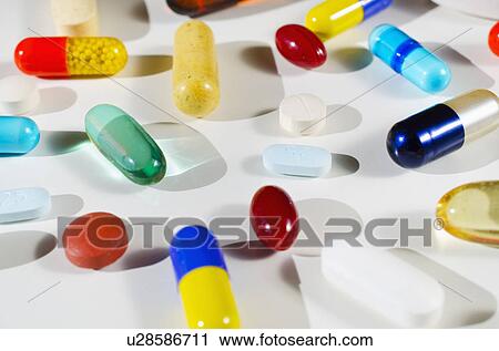 Stock Image - Studio shot of various pills and capsules. Fotosearch