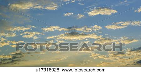 Sunset sky with clouds View Large Photo Image Stock Photo - Sunset sky with clouds. Fotosearch