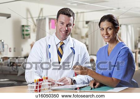 Surgeon and doctor in hospital View Large Photo Image Stock Image - Surgeon and doctor in hospital. Fotosearch