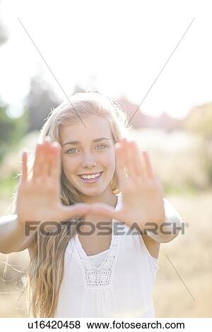 Teenage girl (16-17) displaying stop gesture View Large Photo Image Stock Photo - Teenage girl (16-17) displaying stop gesture. Fotosearch