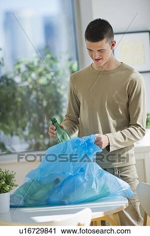 Teenager (16-17) recycling bottles View Large Photo Image Stock Image - Teenager (16-17) recycling bottles. Fotosearch