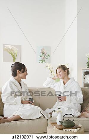 Two women relaxing in spa View Large Photo Image Stock Image - Two women relaxing in spa. Fotosearch