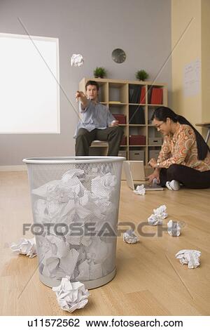 Two young people brainstorming View Large Photo Image Stock Image - Two young people brainstorming. Fotosearch