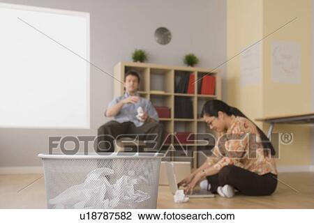 Two young people brainstorming View Large Photo Image Stock Image - Two young people brainstorming. Fotosearch