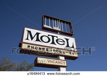 Stock Image - USA, Arizona, Winslow, Old motel sign. Fotosearch