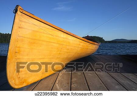 USA, Maine, Canoe in evening light View Large Photo Image Stock Image - USA, Maine, Canoe in evening light. Fotosearch