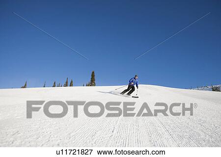 USA, Montana, Whitefish, Tourist on ski slope View Large Photo Image Stock Photo - USA, Montana, Whitefish, Tourist on ski slope. Fotosearch