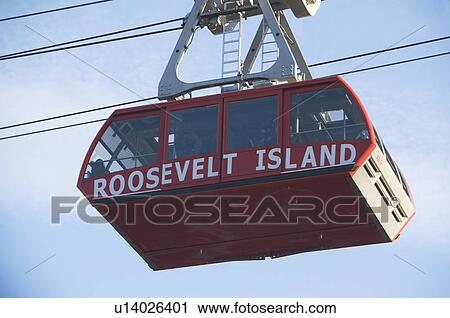 Stock Image - USA, New York City, Low angle view of Roosevelt Island Tram gondola. Fotosearch
