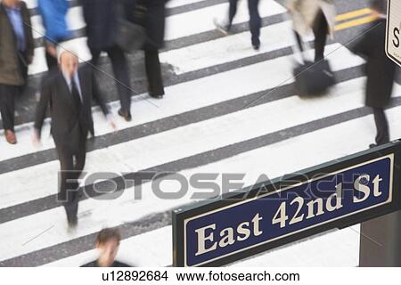 Picture - USA, New York City, Manhattan, 42nd street, Pedestrians on zebra crossing. Fotosearch