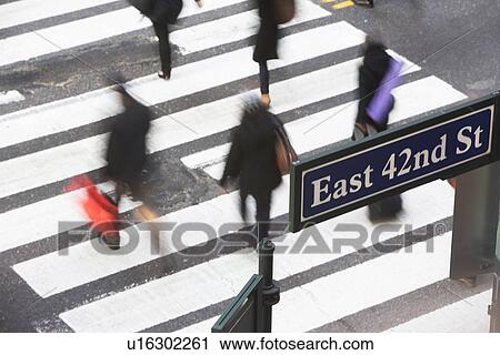 USA, New York City, Manhattan, 42nd street, Pedestrians on zebra crossing View Large Photo Image Stock Image - USA, New York City, Manhattan, 42nd street, Pedestrians on zebra crossing. Fotosearch