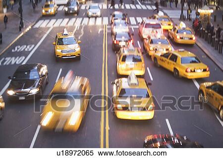 Stock Photography - USA, New York City, Manhattan, Traffic on 42nd street. Fotosearch