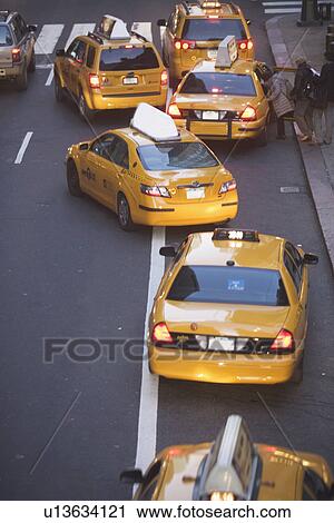 USA, New York City, Manhattan, Yellow cabs on 42nd street View Large Photo Image Stock Image - USA, New York City, Manhattan, Yellow cabs on 42nd street. Fotosearch
