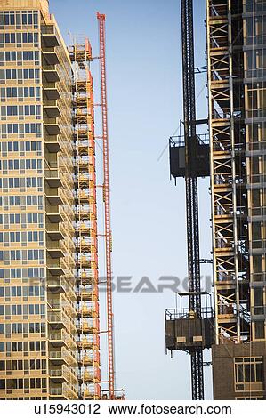 Stock Image - USA, New York City, Modern office blocks under construction. Fotosearch