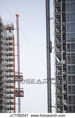 USA, New York City, Modern office blocks under construction View Large Photo Image Stock Image - USA, New York City, Modern office blocks under construction. Fotosearch