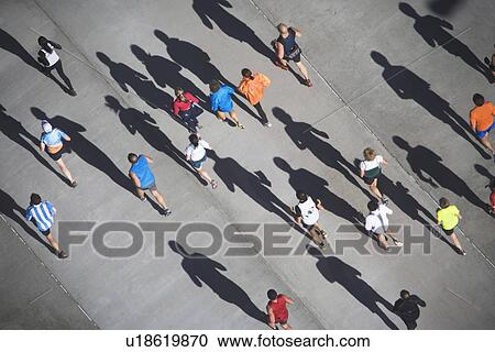 Stock Image - USA, New York City, New York City Marathon as seen from above. Fotosearch